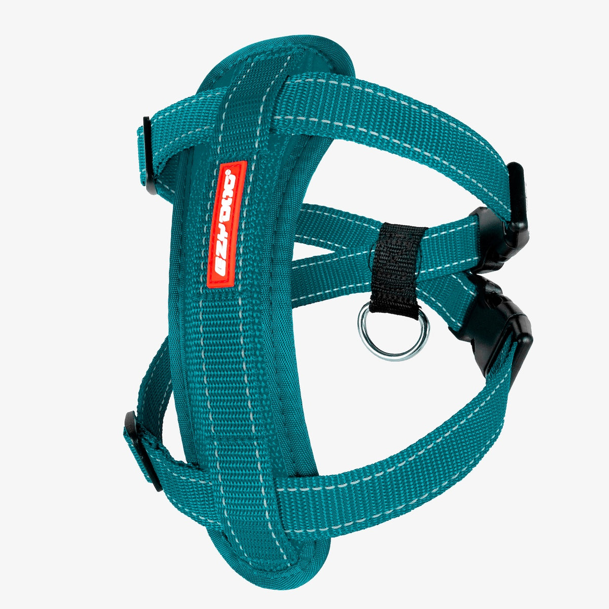 A teal Chest Plate Dog Harness with adjustable straps, a metal ring, and a label showing the brand name.