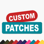 Two custom die-cut patches on a light gray background: a red rounded rectangle patch reading 'CUSTOM' and a teal rounded rectangle patch reading 'PATCHES'. Small 'ezydog.