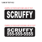 Two rectangular black patches with rounded corners on a white background, each showing the word 'SCRUFFY' in large white letters. The top patch has one line of text above it in red, and the bottom patch has a phone number in red.