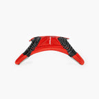 Red and black dog toy on a white background