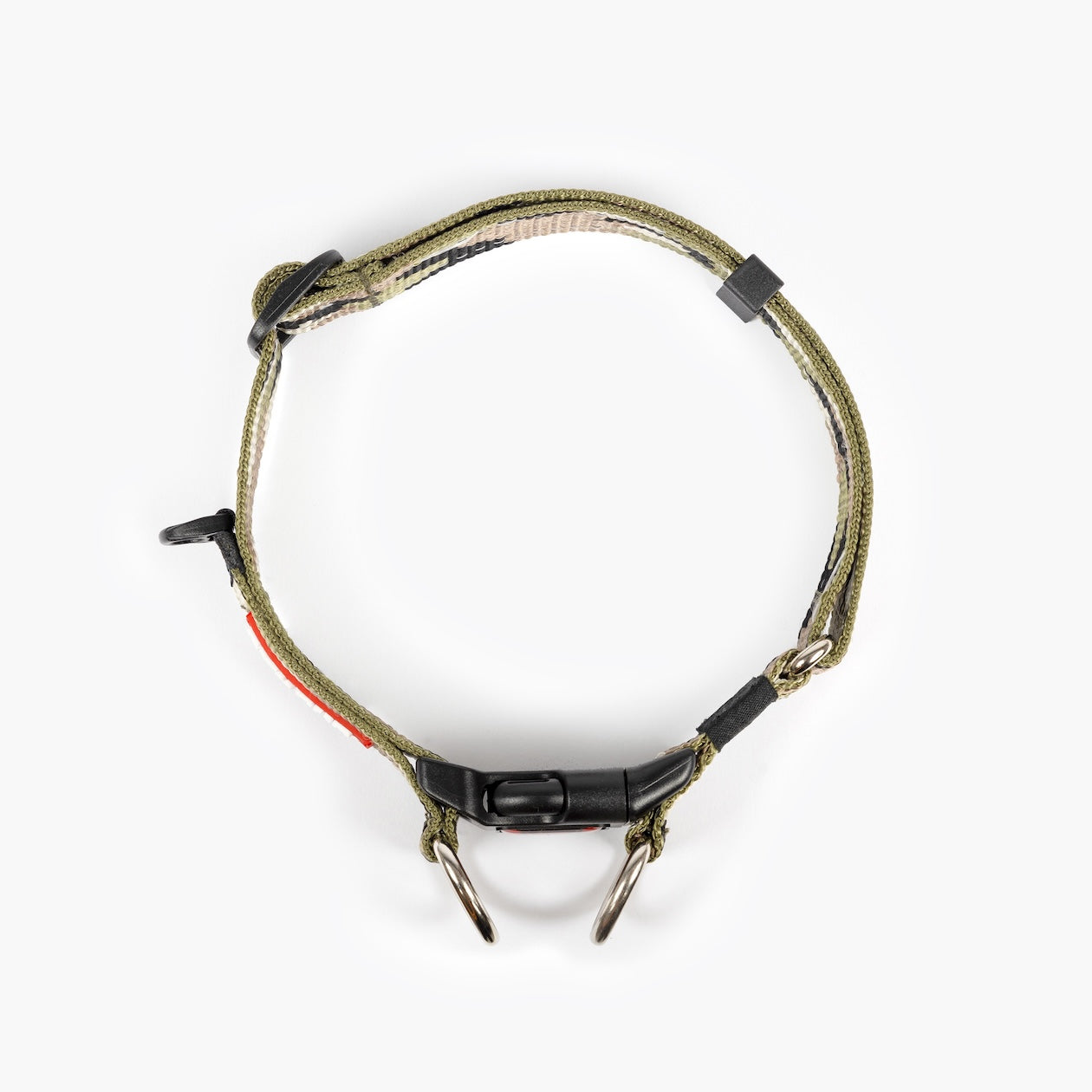 Dog collar with camouflage pattern on a white background