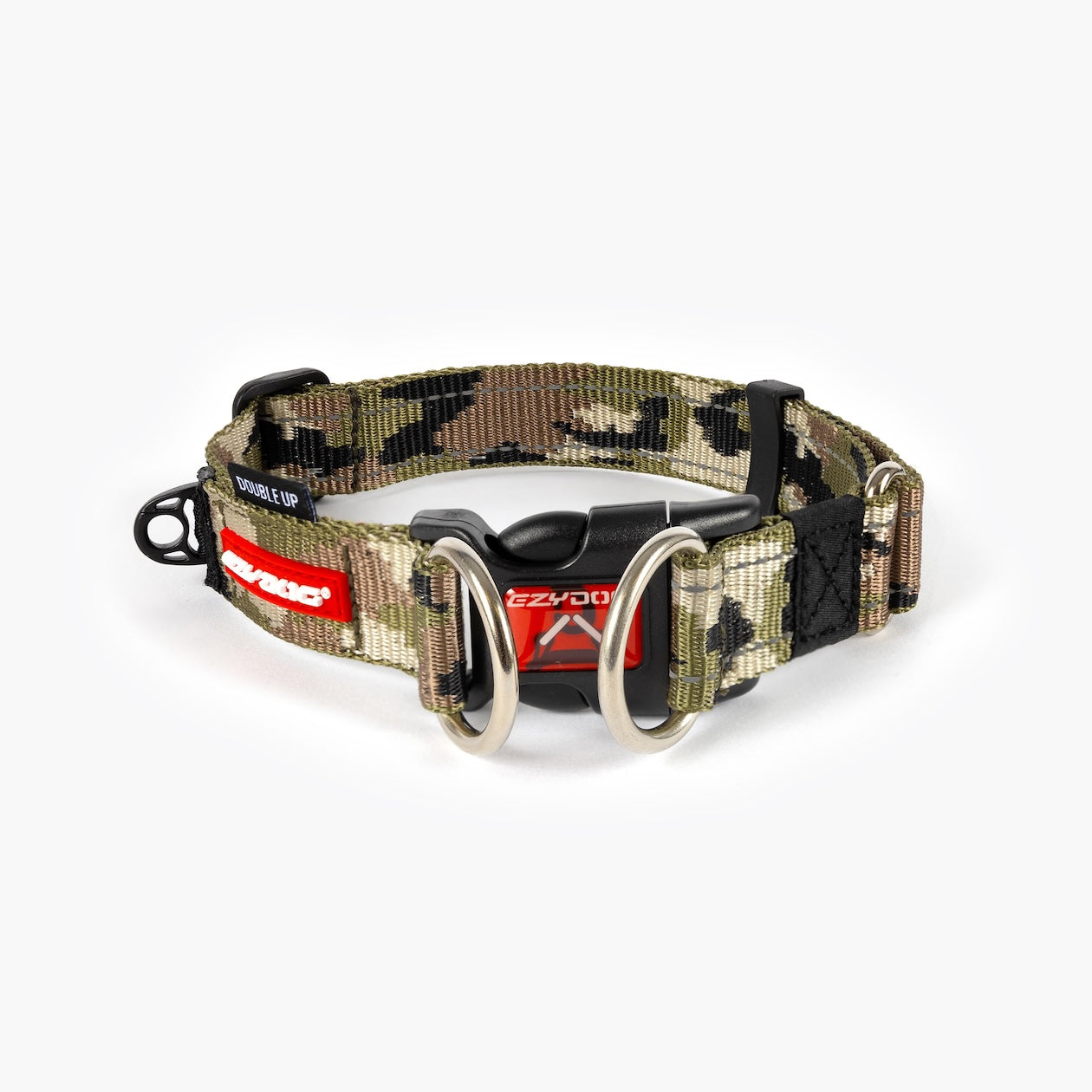 A camoflauge dog collar with a metal buckle, designed for durability and comfort.
