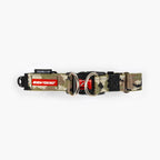 Camouflage dog collar with red and black accents on a white background