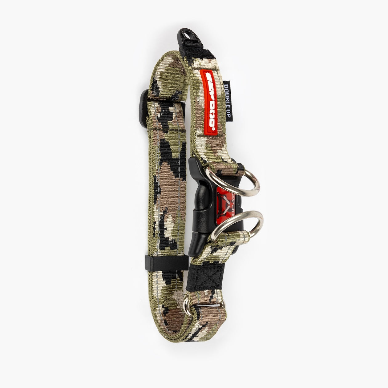 Camouflage-patterned dog collar with metal components on a white background