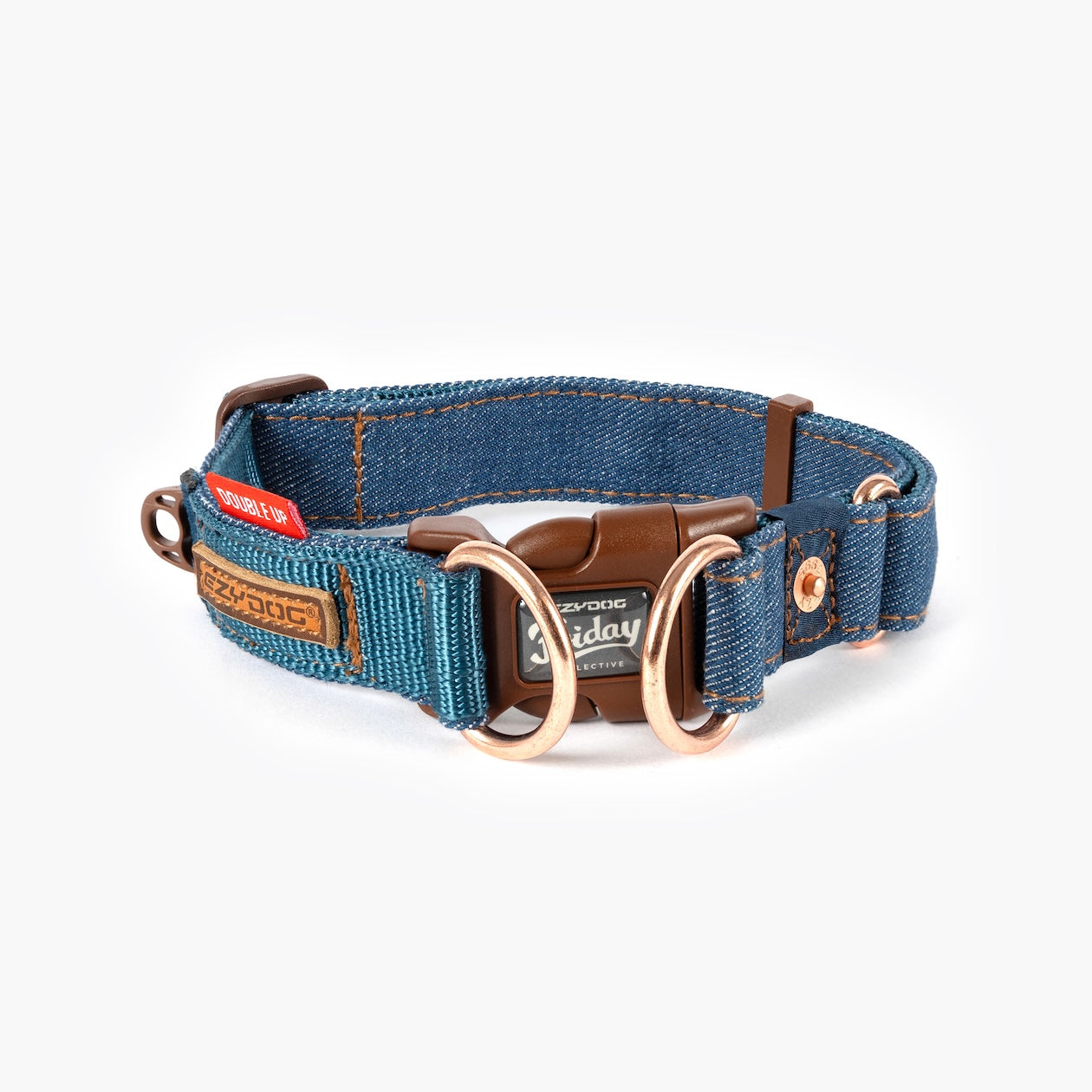 Denim dog collar with brass hardware on a white background