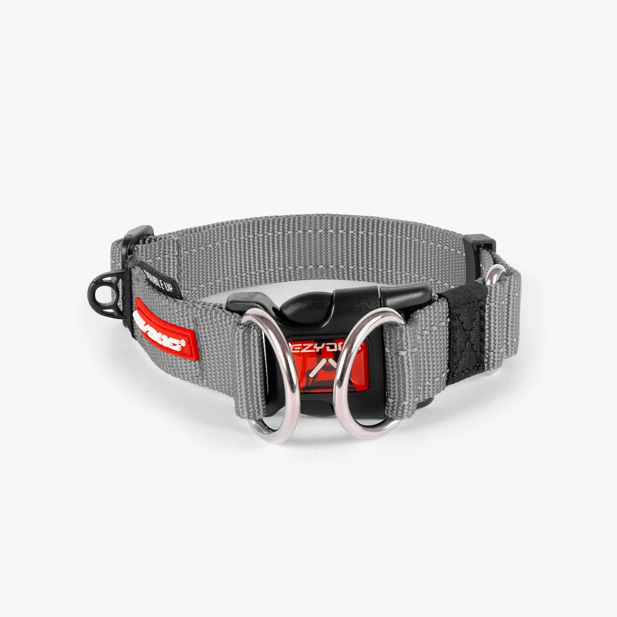 A gray dog collar with a metal buckle, designed for durability and comfort.
