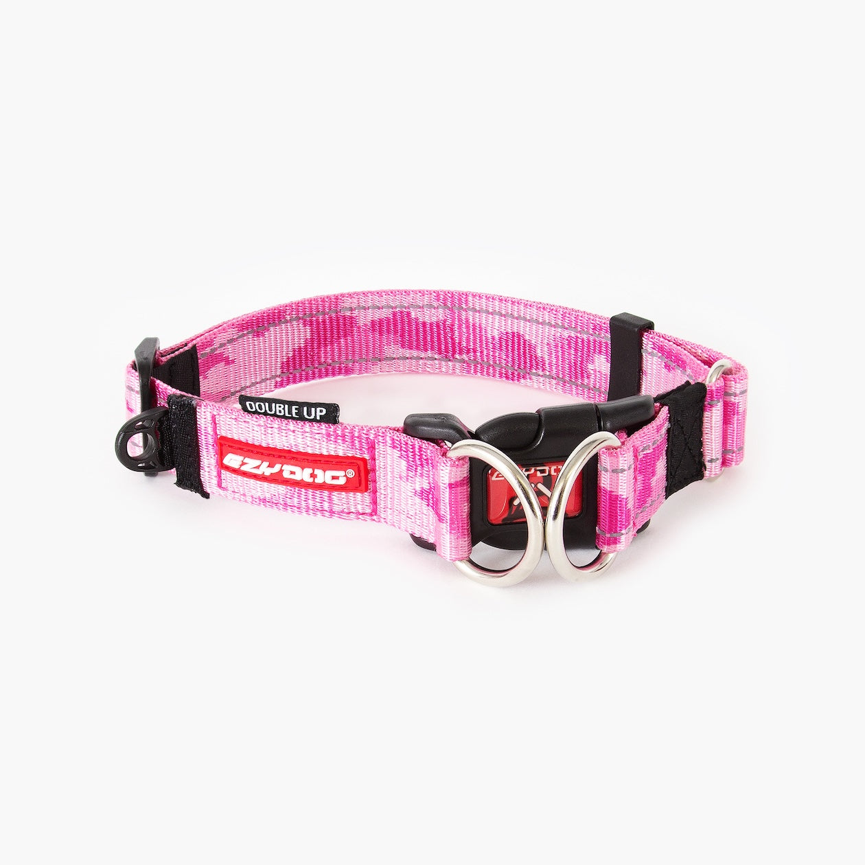 A pink dog collar with a metal buckle, designed for durability and comfort.