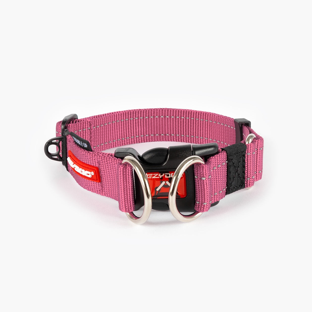 A pink dog collar with a metal buckle, designed for durability and comfort.
