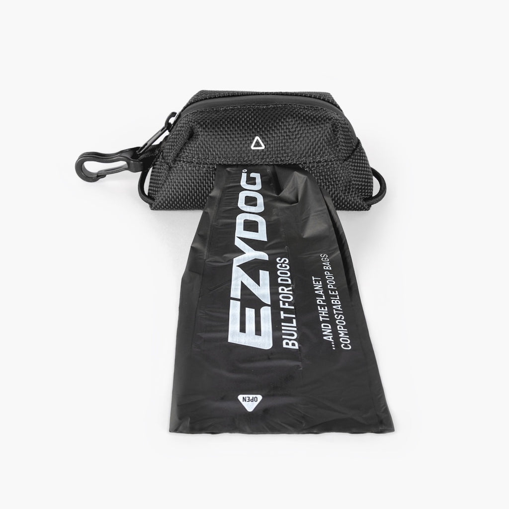 Dog poop bag pulled from the EzyDog Essential Poop Bag Holder