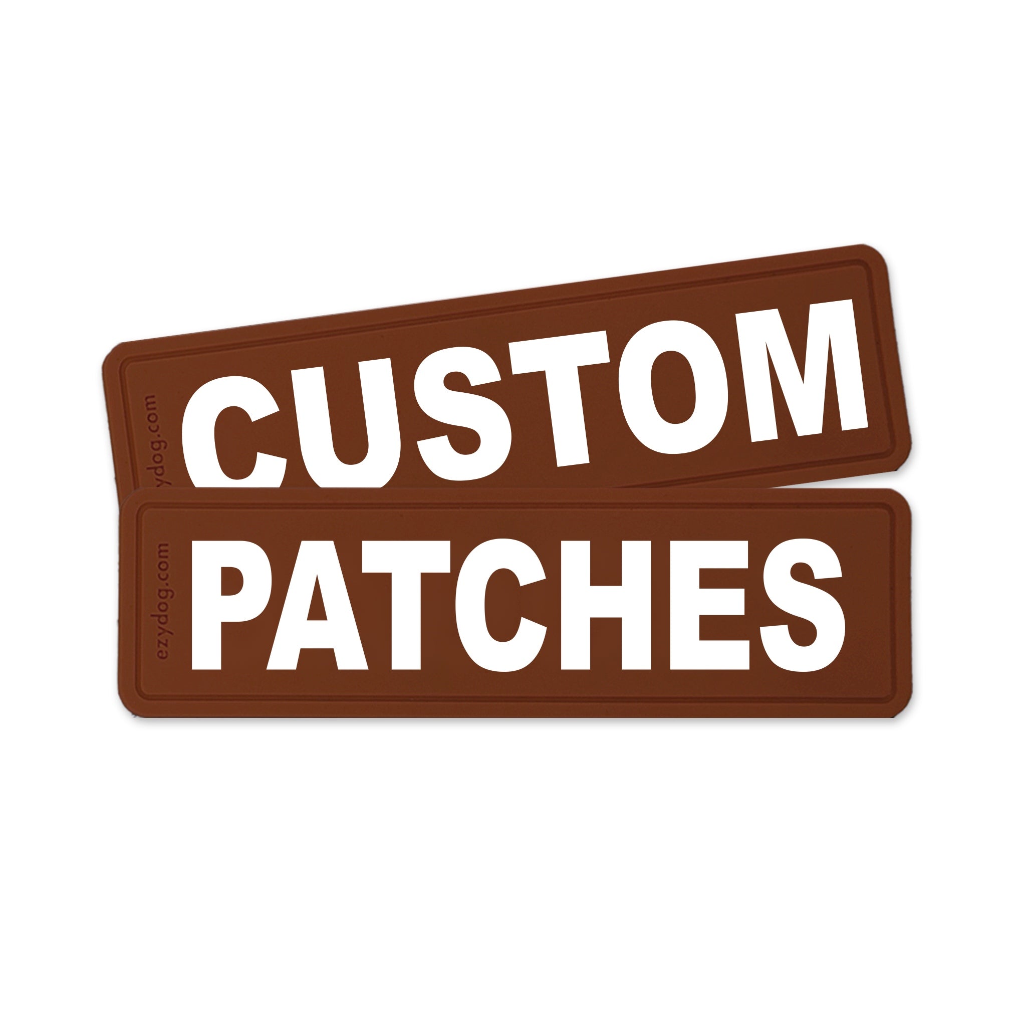 Two brown rectangular patches with rounded corners, stacked slightly offset. The top patch reads "CUSTOM" in large white letters, and the bottom patch reads "PATCHES" in large white letters.