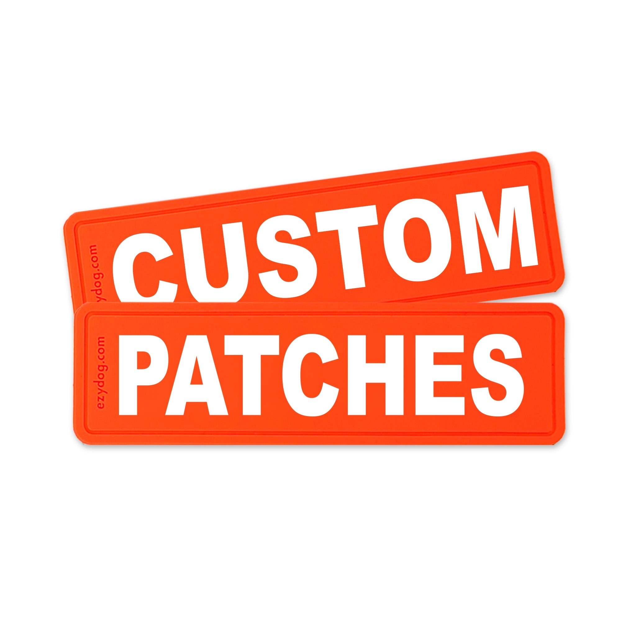 Two bright orange rectangular patches with rounded corners, stacked slightly offset. The patches feature the words 'CUSTOM PATCHES' in large, bold white capital letters.