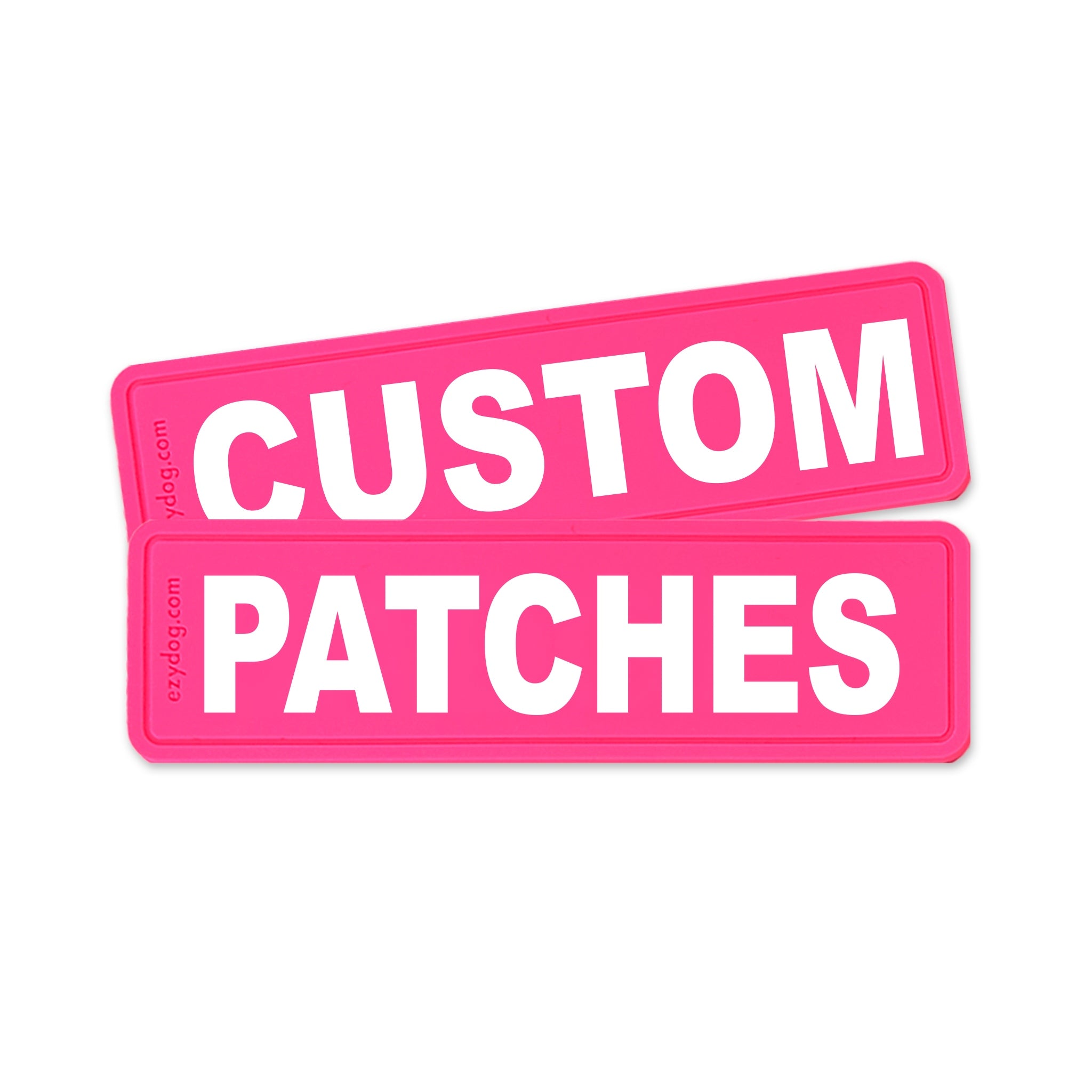 Two bright pink rectangular patches with rounded corners, stacked slightly offset. The top patch reads "CUSTOM" in large white letters, and the bottom patch reads "PATCHES" in large white letters.