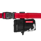 Red dog collar with black clip, fold a bowl, and 'EzyDog' branding on a white background