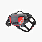 A gray and red Summit Dog Backpack with adjustable straps and a label showing the brand name 'EzyDog' on the front pocket.