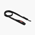 A black nylon dog leash with a red logo and metal clasp.