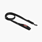 A black nylon dog leash with a red logo and metal clasp.