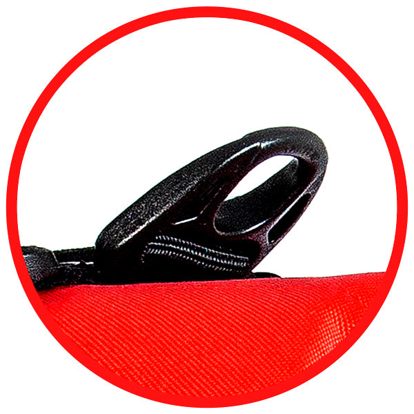 Close-up of a black clip on a red background
